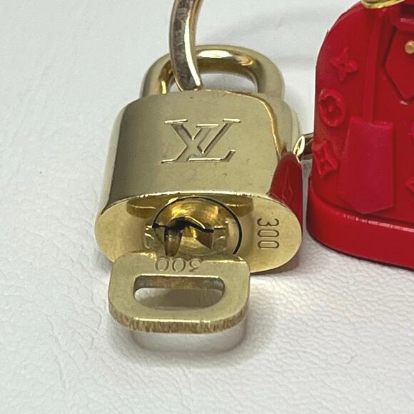 Louis Vuitton Lock and Key Set #300 with a Red Mini Fashion Handbag Keychain - Picture 3 of 5